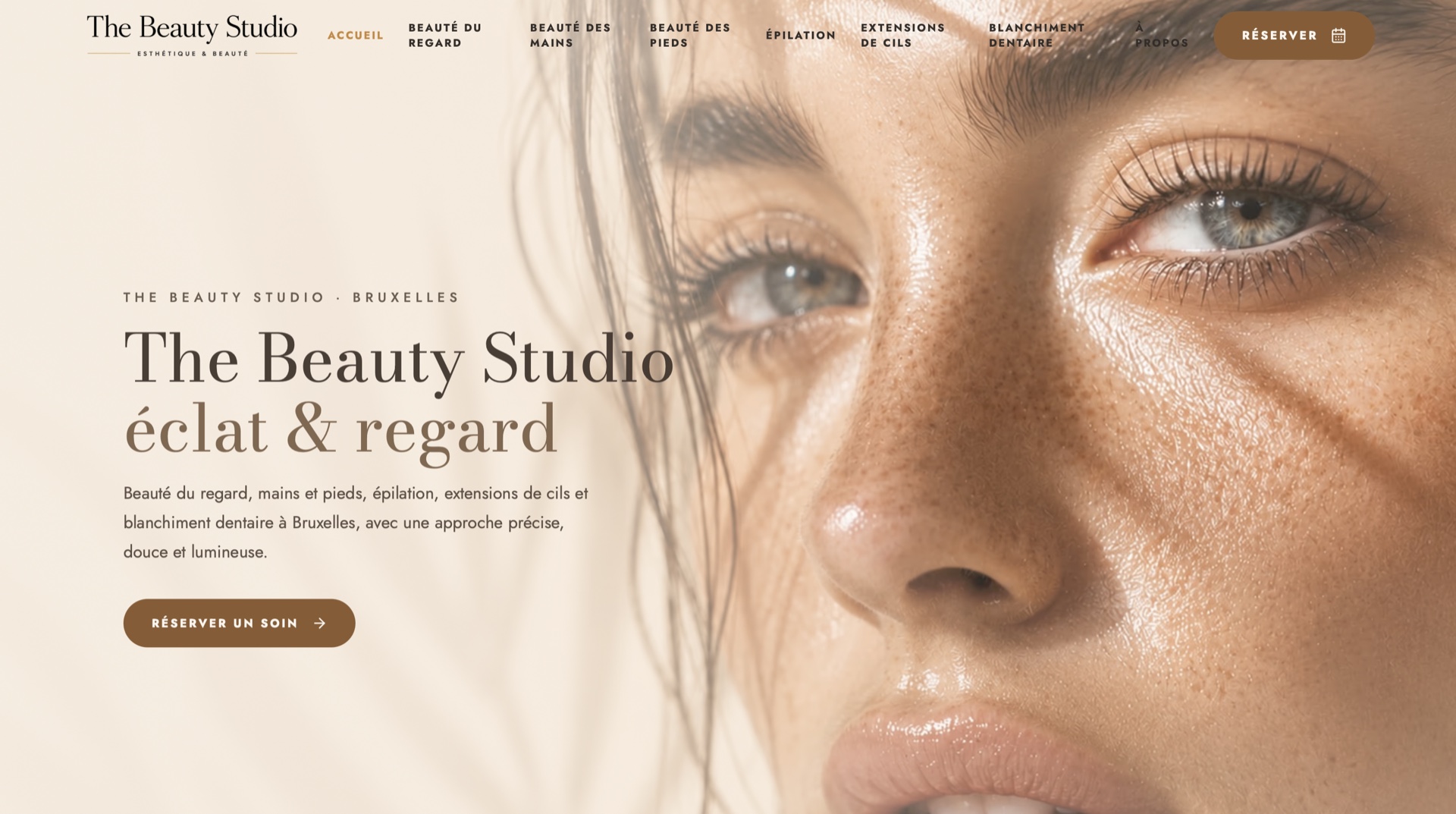 The Beauty Studio homepage with a close beauty portrait and luminous editorial direction.